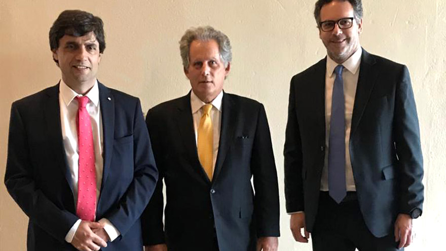 Hernán Lacunza, David Lipton y Guido Sandleris.