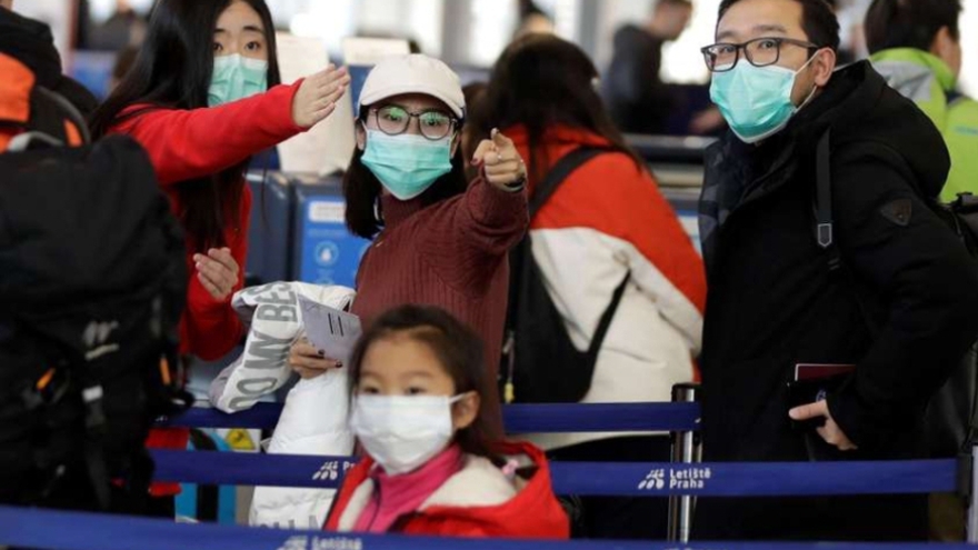 China autoriza tener tres hijos por familia