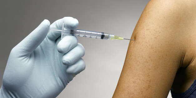Person receiving a vaccine